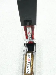 HAWT GURL SUMMA COLLECTION Bronze Suga and Ruby Wine  Lip Floss High Shine lip gloss is a non-sticky formula enriched with shea butter and vitamin E to moisturize and soften lips. It provides a high-shine, lightweight, and is long-lasting    4.5ml