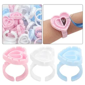 100pcs Hypoallergenic Heart-Shaped Eyelash Extension Cups, Ideal for Salon Use and DIY, Perfect for Lash Professionals and Aficionados