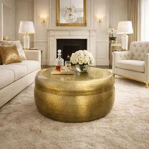 32 Inch Artisanal Round Drum Coffee Table, Hammered Embossed Texturing, Aluminum, Antique Brass By The Urban Port