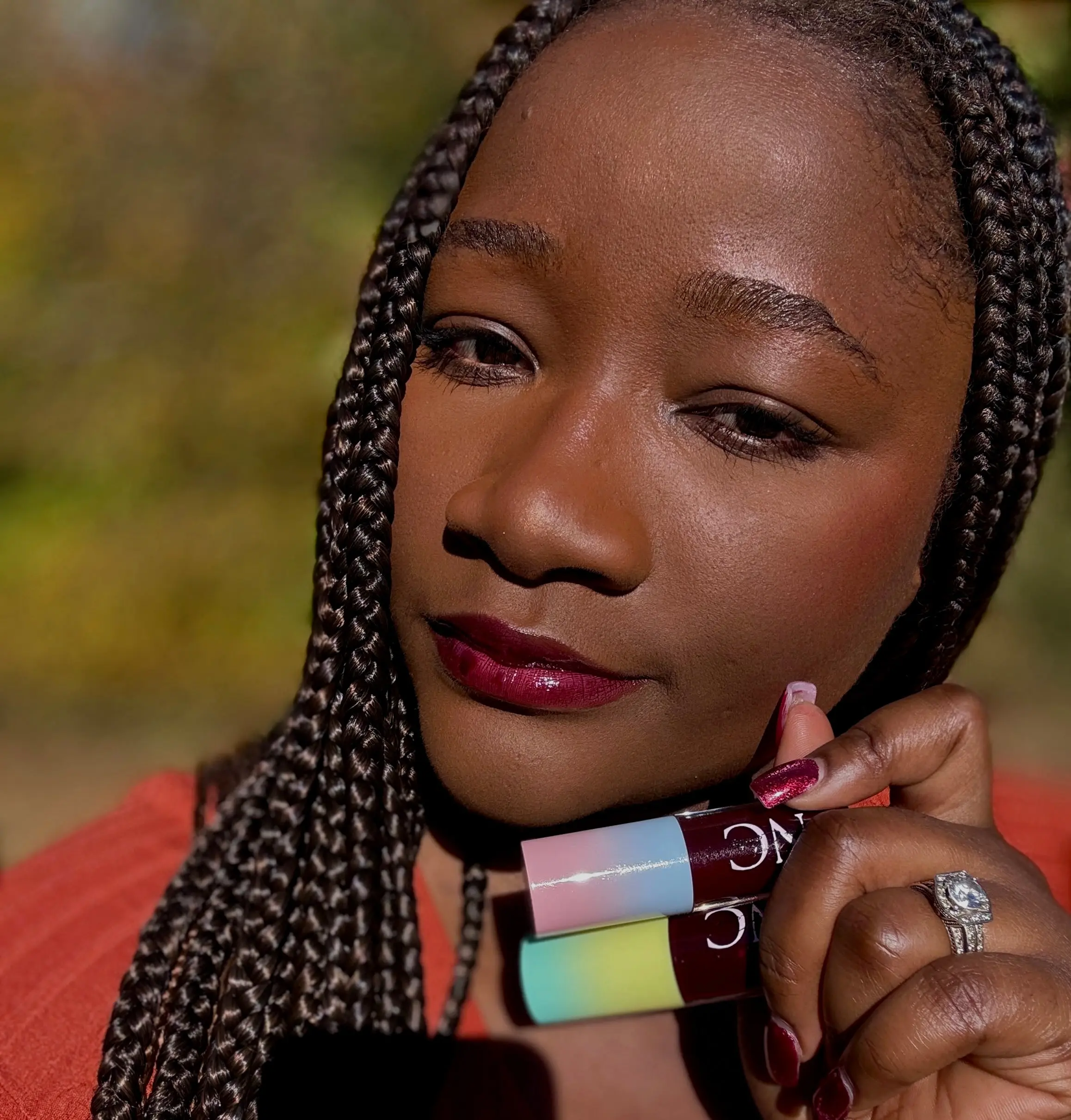 Vamp Red High-Shine Lip Gloss, Berry-Toned, Lightweight Cosmetic, Radiant Finish, Gentle on Lips