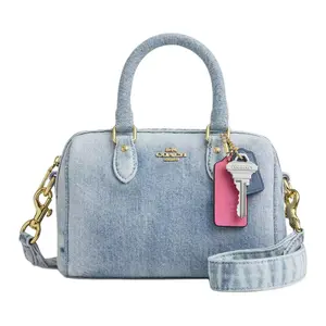 Coach Rowan 17 Denim Boston Bag for Women – Adjustable Crossbody and Top-Handle, Signature Logo Charm, Light Blue