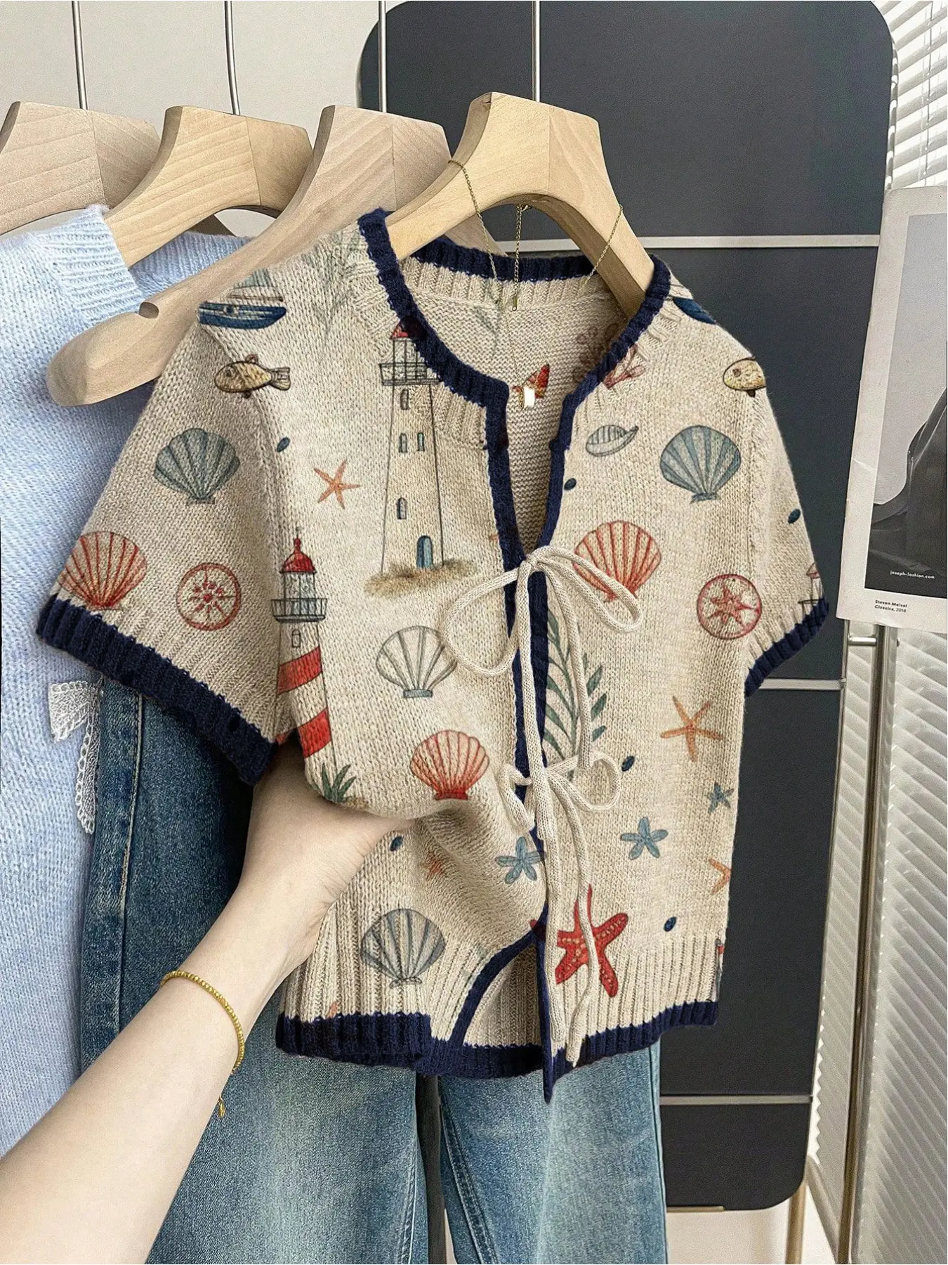 Women's khaki bohemian vacation short-sleeve knit top. Loose round neck, contrast seaside print, front tie and contrast piping. Lightweight, stylish and ideal for spring & summer casual comfy classy wear. Womenswear Lady