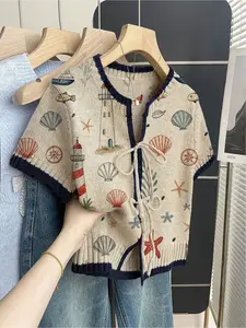 Women's khaki bohemian vacation short-sleeve knit top. Loose round neck, contrast seaside print, front tie and contrast piping. Lightweight, stylish and ideal for spring & summer casual wear. Womenswear Lady