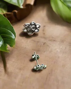 Sol Taino Stainless Steel Earrings - Simple Design with Key and Flower Elements