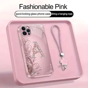 Suitable for [iPhone 12 Pro Max] high-end women's phone case🤩，a beautiful four-leaf clover lanyard is included🍀，Exquisite floral print, non-3D rhinestones, 26 letters to choose from YM99