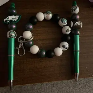 Eagles Silence green and white beads and  Eagles Forces on the pens andEagles wristlet keychain