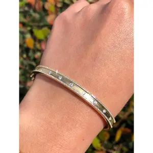 14K Gold Spaced Out Diamond Bangle