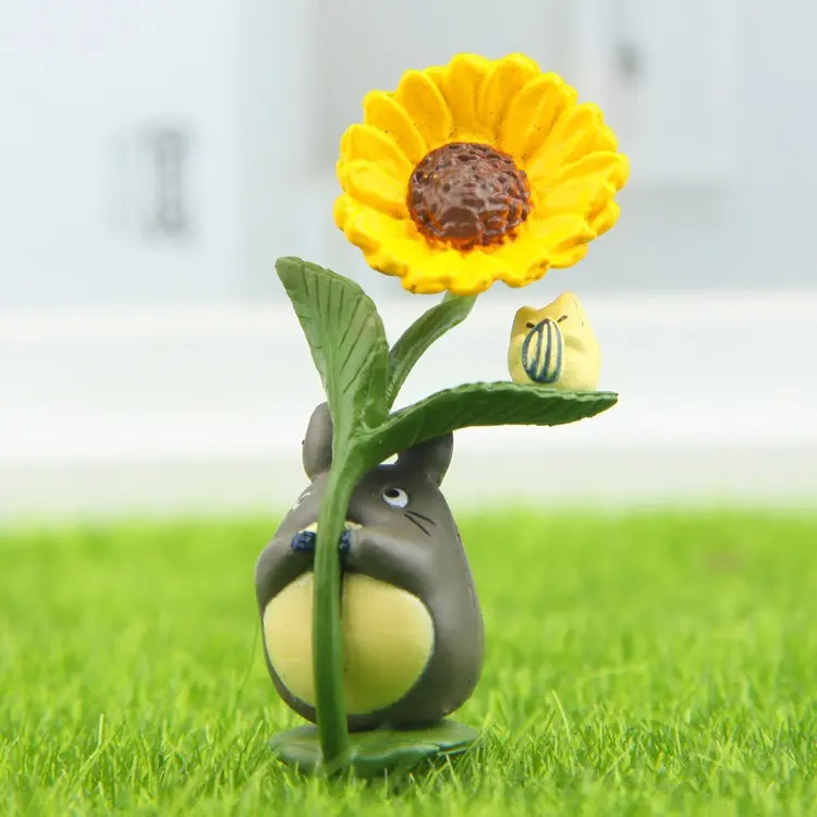 Cute figure holding sunflower for plant  home  bathroom decor