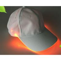 White hat orange light