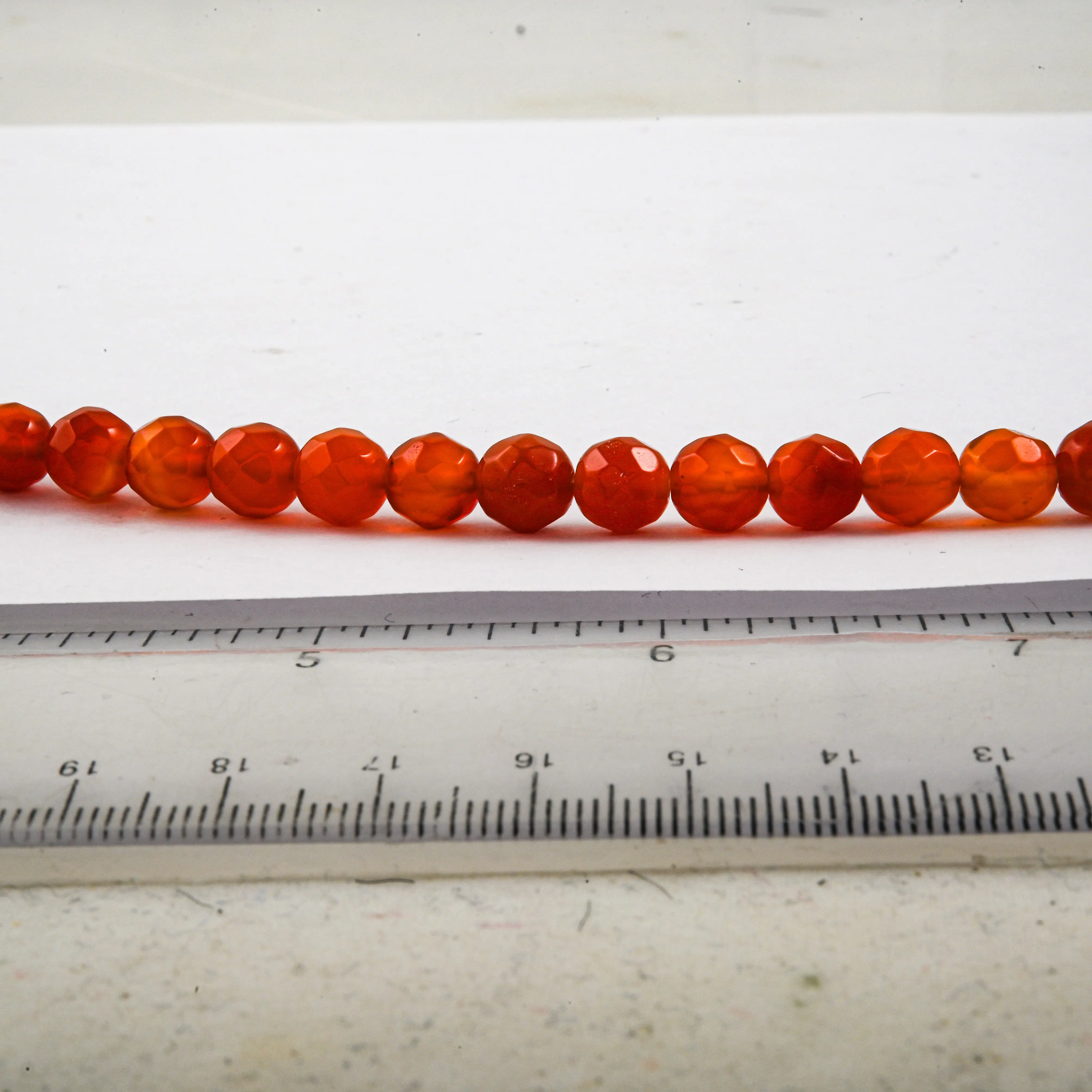 GCS 8mm Faceted Round Carnelian Beaded Strand (15 Inches) 163.70 ctw