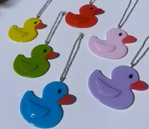 Stained Glass Rubber Ducky Car Charm! Cute decoration to either hang in your car or to brighten up your home! Choose from a Rainbow of Colors!