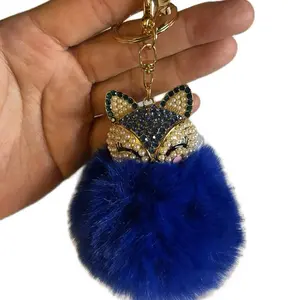 Blue Fox Puff Keychain or Bag Charm with Sparkling Rhinestones and Soft Royal Blue Fur for Stylish Accessories