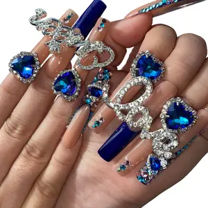 B2  Handmade high quality nude long coffin press on nails with royal blue tips opulent blue heart crystals silver love charms and lavish colorful gem accents