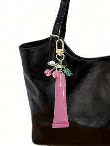 Cherry leaf lipstick pendant keychain, 15ml portable lip gloss holder. Stylish hanging design for bags, wallets and keys. Great daily accessory and holiday gift. (Only packaging)