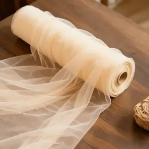One roll of vibrant champagne-colored polyester elegant ethereal tulle fabric, hand washable, suitable for weddings, parties, Valentine's Day, Christmas decorations, chair back bows, table decorations, and ceiling decorations, 12.6 x 1969 inches
