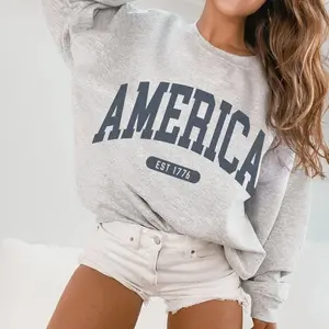 America sweatshirt EST 1776 featuring a faded vintage aesthetic, trendy USA crewneck with classic varsity style, perfect for patriotic everyday wear.