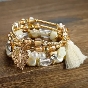Bohemian 4-piece bracelet set, acrylic leaf flower bead decoration, tassel hollow leaf multi-layer elastic bracelet, stackable, beautiful bracelet suitable for women to give gifts and wear daily,bracelet stack
