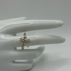 Minimalist Ring with Elegant Marquise Cut Stone in Gold Tone for Everyday Elegance