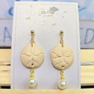 La Clay Dreams Sand Dollar Starfish Polymerclay Earrings with Golden Accents and Pearl Charm for Stylish Wear