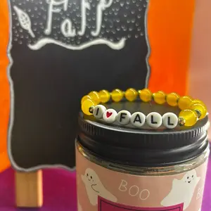 jewelry by Zo fall collection, contains earrings, glass bead bracelets, clay bead bracelets, and a bracelet set.