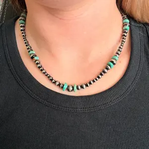 Stainless steel graduated bead and turquoise beaded necklace