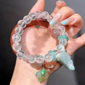 084 Clear Quartz Sunstone Jadeite bracelet