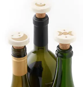 INDUKALA BOTTLE STOPPER, CORK - BONE, BRASS, ASSORTED MOON DESIGNS