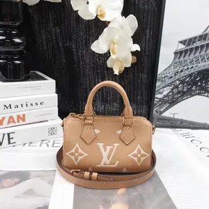 Pre-owned Calfskin Shoulder Bags Louis Vuitton Speedy Nano Beige SHoulder Bag T10327106