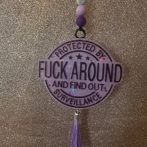 FAFO Car Freshie - Protected by Surveillance Design with Purple Tassel and Glitter Accents