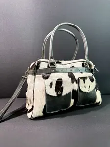 The Outlaw Weekender™ – Black & White Cowhide Leather Travel Bag