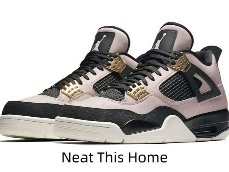 Structured mid-top sport shoes with ventilated mesh sections, light pink suede and black trim, shiny metallic gold hardware adds highlights to your outfits.