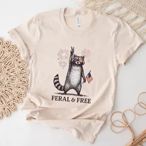 Feral & Free Comfort 4th of July T-Shirt, USA Independence Day Shirt, Funny Raccoon Tee, Patriotic Raccoon Shirt, July 4th Gift
