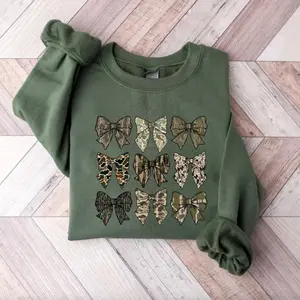Camo Bow Sweatshirt, Camo Coquette Bow Shirt, Duck Hunting T-shirt, Hunting Lover Gift, Women's Camouflage Bow Sweatshirt, Camouflage Bow Hoodie, Casual Cotton Crewneck Printed Graphic Tee, Gift For Women For Men