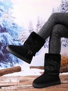 A pair of fashionable and casual women's belt buckle snow boots, cute cream short boots with plush lining, warm winter ankle boots with thick soles and high heels.