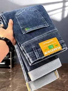 Men's Vintage Washed Denim Jeans, Elastic Slim Fit Straight Leg, Embroidered Pockets, Leather Tag, Roll-Up Hem, Trendy Long Pants