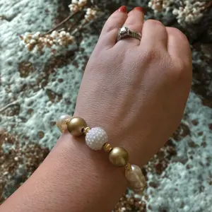 Pearlescent Bracelet with Large White Textured Focal Bead Gold Accent Beads for Elegant Style Stretch Fit Average Wrists