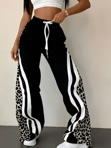 A women's black leopard-print striped wide-leg sweatpants with white contrasting stripes, drawstring waist, and pocket design, perfect for summer and suitable for daily wear or athletic outfits.