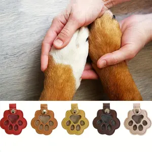 1/5pcs Leather Pet Memorial Keychain - Paw Print & Heart Design Hair Keepsake Storage Bag, Compact Portable Key Ring for Cat & Dog Lovers, Durable Leather Memento Organizer