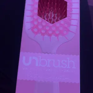 Product Review of Unbrush Detangling Hair Brush by FHI Heat from T**!