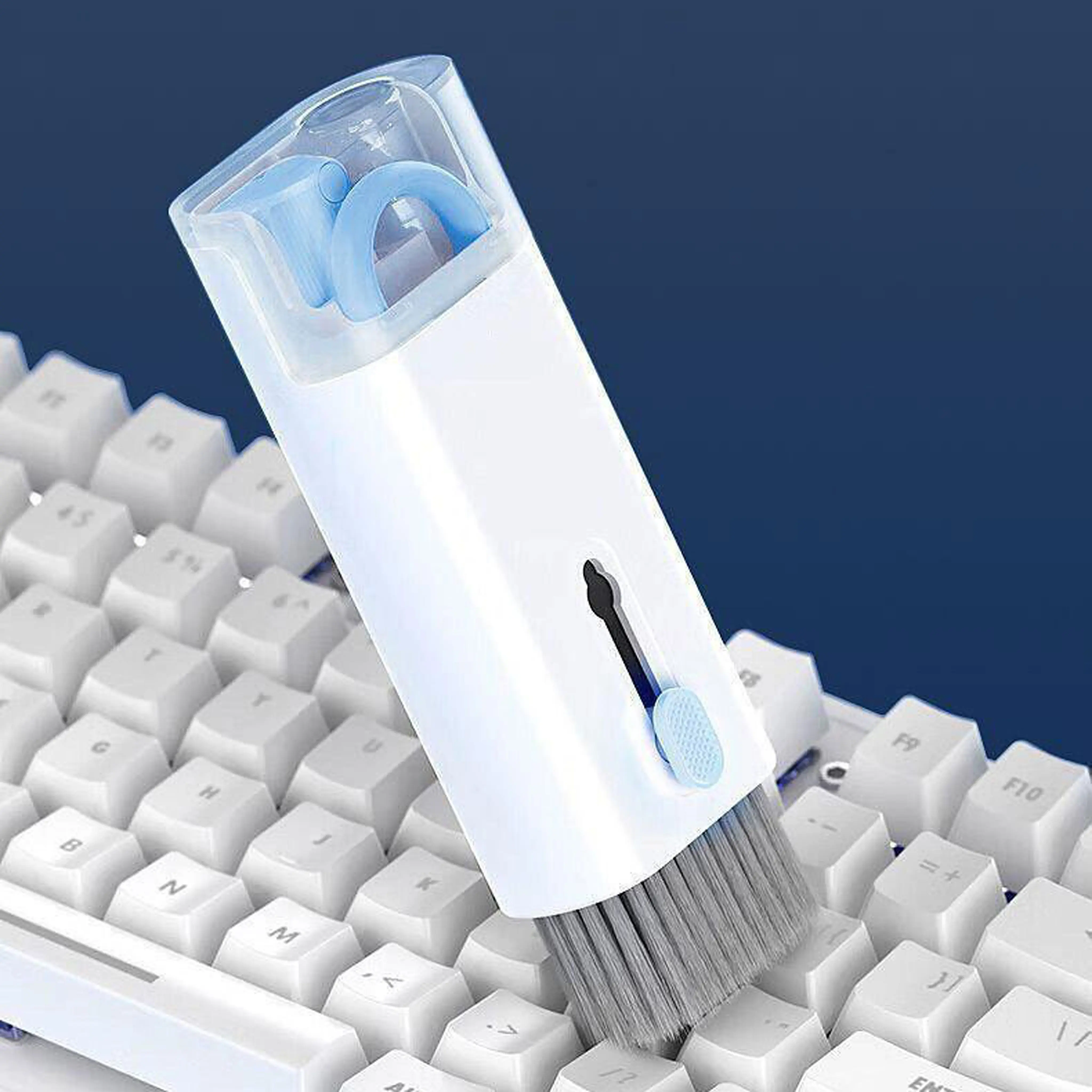 7-piece keyboard cleaning set equipped with soft silicone tips, a sponge pad, and microfiber cloth—a sturdy ABS handle that effectively removes dust, debris, and fingerprint marks from laptops, mechanical keyboards, camera lenses, and headphone jacks; por