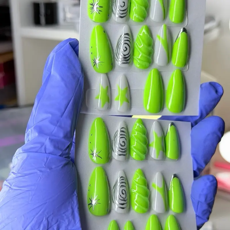 Bright neon green handmade press-on nails with a modern abstract design