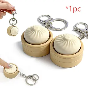 LED luminous steamed bread shape key ring, creative small cage bag keychain pendant, press-type button keychain small pendant can be hung on the bag, suitable for work fatigue and irritability