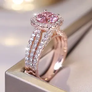 Gorgeous four prong bright pink round cubic zirconia ring with rose gold plated decoration suitable for women to wear everyday and as a gift for friends and lovers
