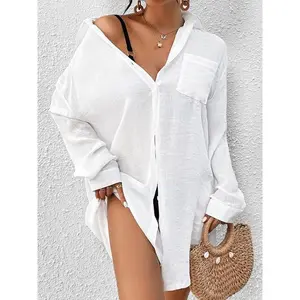 Plus-size solid swim top with drop shoulders, button front, and pockets; casual long-sleeve collared cover-up for summer; women’s swimwear for beach holidays