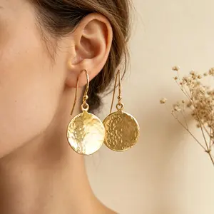 The Classic Gold Earring, Reimagined With Hand-Hammered Texture #DropEarrings #GoldDiscEarrings #TimelessDesign #GiftForHer
