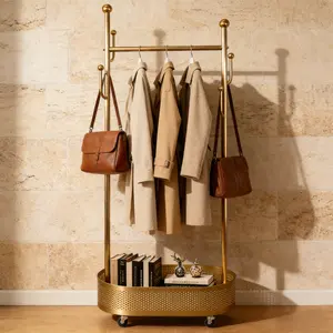 Multifunctional Clothes Rack with Storage Baskets & Wheels Freestanding Design for Easy Fabric Bins Drawers Gold Finish Modern Storage Solution