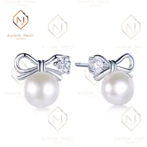 Mother of Pearl Studs With Moissanite Bow