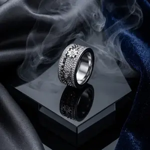 The Onyx Orbit/ Gear Mechanism Ring - Elegant Design with Intricate Gear Details and Sleek Finish