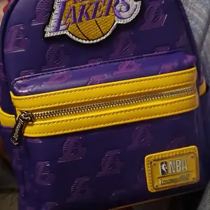 Loungefly x NBA Los Angeles Lakers Debossed Logo Mini Backpack – Purple & Gold Loungefly NBA LA Lakers Debossed Logo Mini Backpack - TikTok  main image 2
