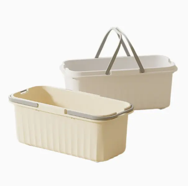 This long plastic storage basket with portable handles keeps bathroom & laundry items neatly organized for small apartments